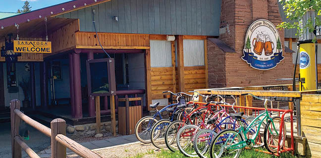 A row of bicycles are parked in front of a building. AI generated content